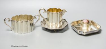 A collection of assorted silver to include a Persian pierced white metal dish, an 800 standard jug