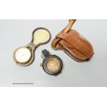 A small leather-cased military compass together with a cased compensated pocket barometer, E.Bryan,