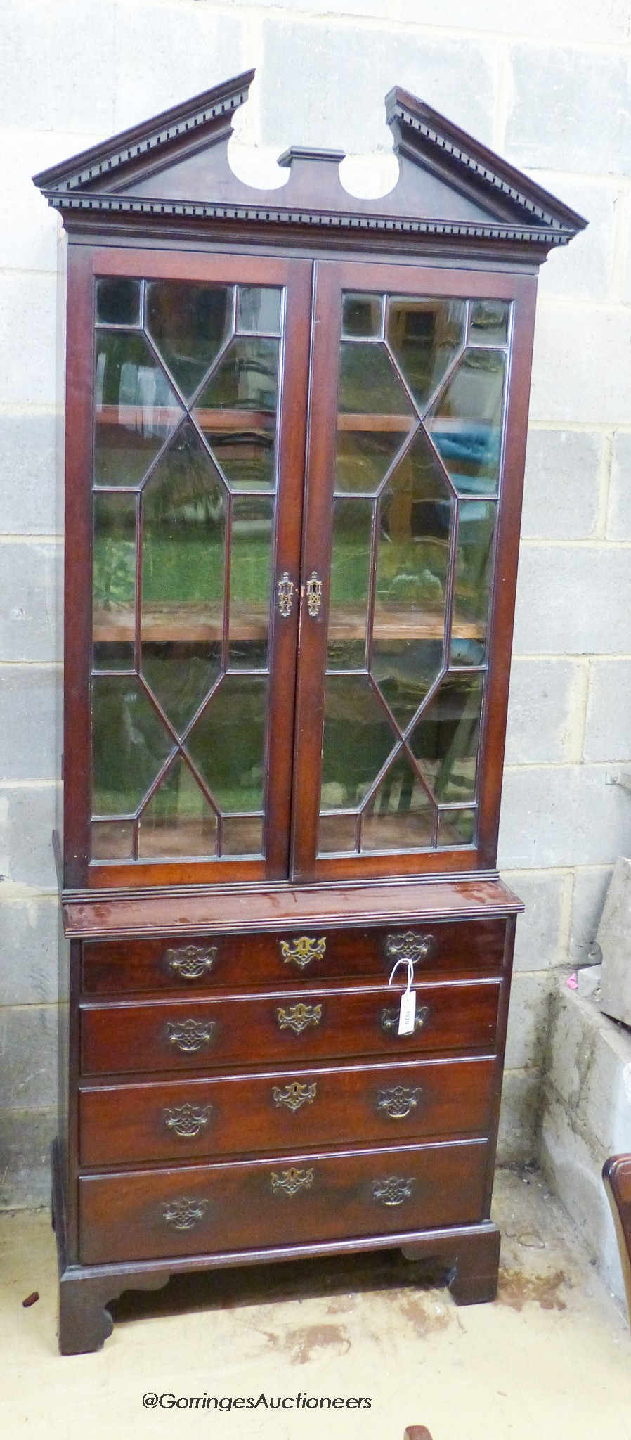 A George III style mahogany bookcase/gun cabinet, W.78cm D.41cm H.212cm