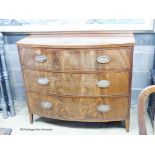 A Regency banded mahogany bow fronted three drawer chest of drawers, W.109cm D.53cm H.92cm