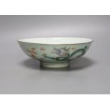 A Chinese famille rose ‘dragon’ bowl, Qianlong mark, 19th century, diameter 21cm