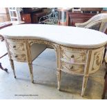 A Louis XVI style parcel giltwood and painted kidney shaped dressing table with marble top, width