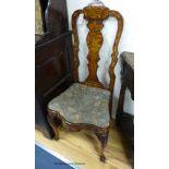 A pair of late 18th century Dutch floral marquetry walnut high back dining chairs