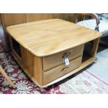 An Ercol elm Windsor storage coffee table, width 78cm, depth 78cm, height 40cm
