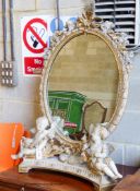 A late 19th century Louis XV style giltwood and gesso painted toilet mirror, width 76cm, height