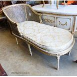 A Louis XVI style painted, giltwood and caned daybed (faults), length 152cm, width 66cm, height