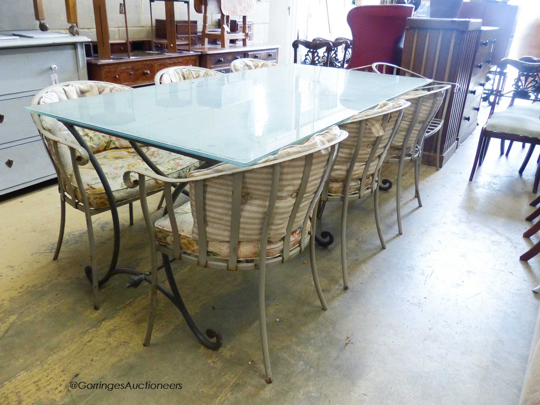 A rectangular glass topped wrought iron garden table and eight chairs. Table, 200x100x75cm. - Image 2 of 3