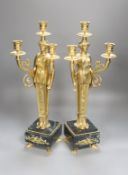 A pair of neo-classical style gilt metal figural candelabra, height 45cm