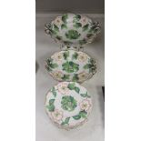 An English porcelain part dessert service, circa 1835 comprising a centrepiece, four serving dishes