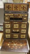 A 17th century Hispano Moresque bone inlaid walnut table cabinet40cm