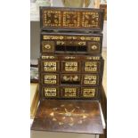 A 17th century Hispano Moresque bone inlaid walnut table cabinet40cm