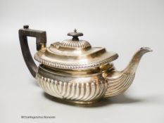 A Mappin & Webb fluted silver teapot, Sheffield, (marks rubbed) presented to ‘Sister Job, From Her