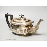 A Mappin & Webb fluted silver teapot, Sheffield, (marks rubbed) presented to ‘Sister Job, From Her