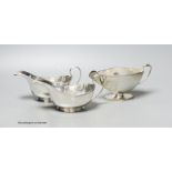 A pair of George V silver sauceboats, London, 1928 and one other silver sauceboat, 14oz.