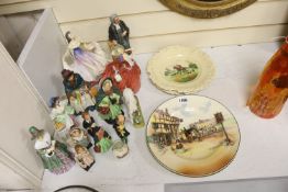 A group of 12 Royal Doulton figures and four plates