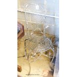 A single metalwork chair, foliage and floral decoration, 92cm high, 37cm wide.