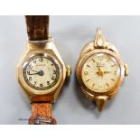 Two lady's 9ct gold cased manual wind wrist watches, including Marvin, one with no strap, gross 18.
