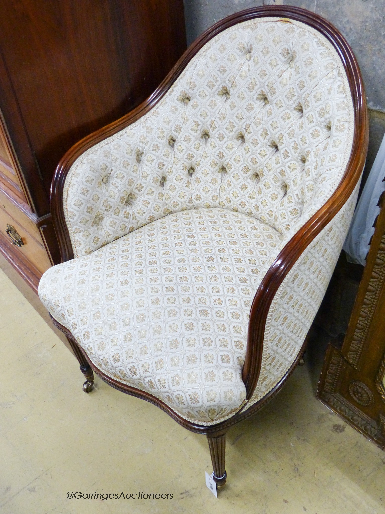 A stylish fluted frame tub chair