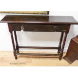 A narrow oak rectangular side table,fitted drawer (made up), width 107cm, depth 25cm, height 77cm