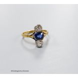 A, 18ct, two stone diamond and single stone sapphire set upfinger ring, size M, gross 2.9 grams,