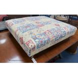 A Victorian style upholstered footstool in Andrew Martin fabric. W-103, D-95, H-28cm.