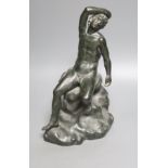 After the Antique a bronze figure of a man seated on a rock, height 34cm