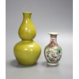 A Chinese yellow ground double gourd vase and a similar famille rose baluster vase, tallest 18cm