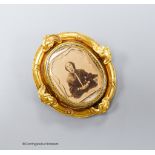 A Victorian yellow metal oval swivelling brooch, 49mm, gross 17.8 grams.