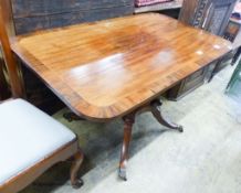 A small Regency banded mahogany rectangular tilt top breakfast table, length 120cm, depth 74cm,