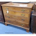 A George III oak chest fitted four graduated long drawers, width 94cm, depth 49cm, height 81cm