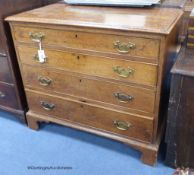 A George III oak chest fitted four graduated long drawers, width 94cm, depth 49cm, height 81cm