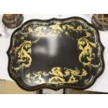 A large 19th century japanned papier mache tray, by B. Walton & Co., length 65cm