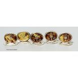 A set of four Edwardian silver and tortoiseshell pique oval menu holders, William Comyns, London,