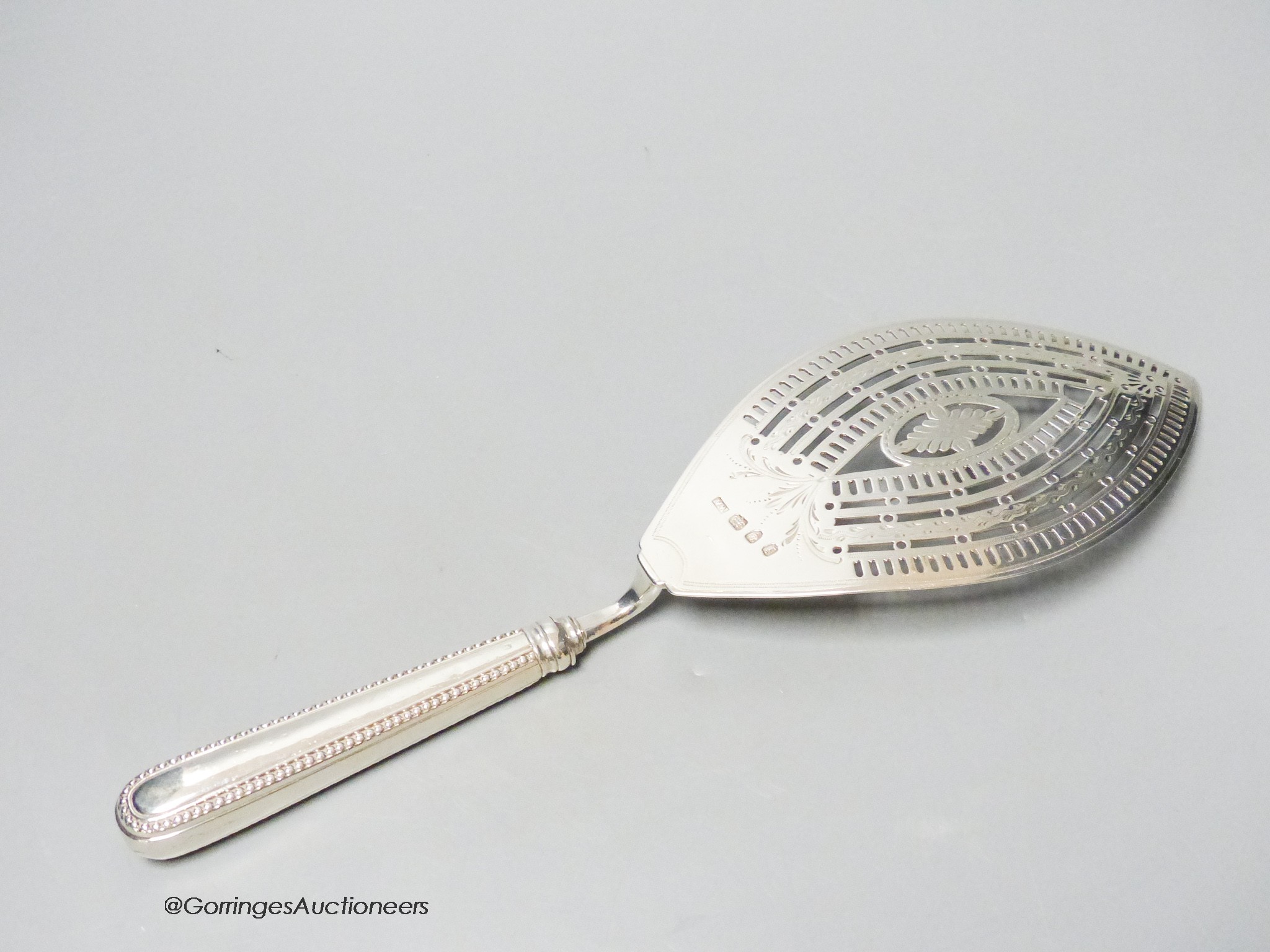 A large George IV silver fish slice, William Abdy I, London, 1784, 30.2cm, loaded handle, gross 4. - Image 2 of 3