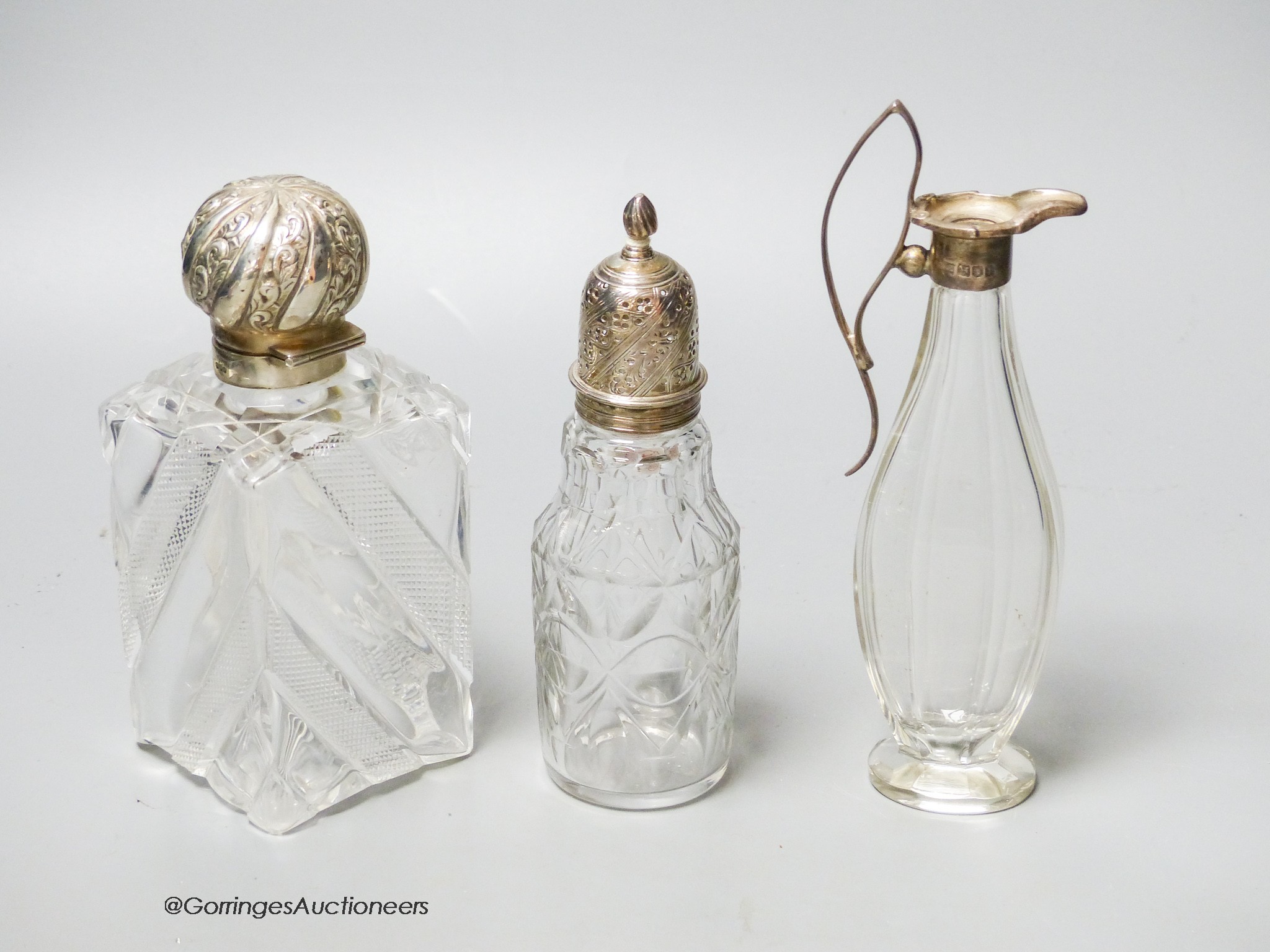 A late Victorian silver topped cut glass scent bottle, London, 1890, 15cm, a later silver mounted - Image 3 of 3