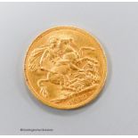A George V 1912 gold sovereign, GVF.