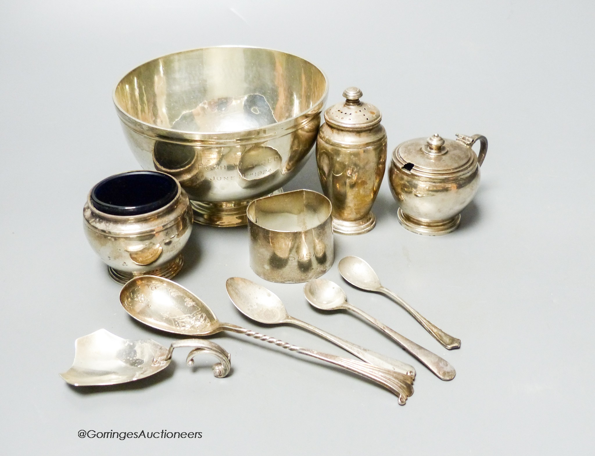 A small collection of English silver and plate to include a footed bowl, mustard pot and salt,