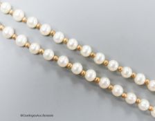 A modern single strand cultured pearl and yellow metal spacer set necklace, the clasp stamped 375,