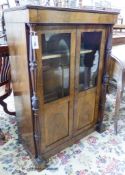 A small mid 19th century French rosewood two door cabinet (faded), width 79cm, depth 43cm, height