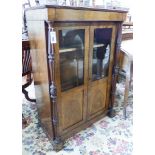 A small mid 19th century French rosewood two door cabinet (faded), width 79cm, depth 43cm, height