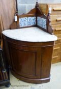 A Victorian mahogany marble topped tile back corner wash stand. W-82, D-58, H-120cm.