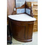 A Victorian mahogany marble topped tile back corner wash stand. W-82, D-58, H-120cm.