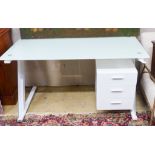 A contemporary white lacquer glass top kneehole desk, length 140cm, depth 70cm, height 75cm