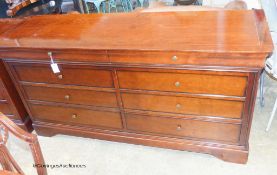 A French style reproduction mahogany eight drawer chest, width 165cm, depth 50cm, height 84cm