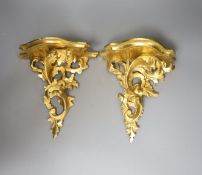 A pair of gilt Florentine style wall brackets