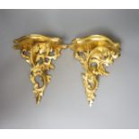 A pair of gilt Florentine style wall brackets