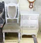 An embossed silvered four drawer small chest, W.52cm D.34cm H.80cm., and a silver painted dining