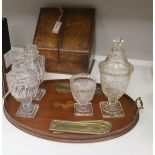 A Victorian walnut stationary cabinet, an Edwardian inlaid oval tray and a group 7 brass