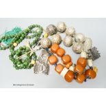 Assorted necklaces including faux amber and other costume jewellery etc.