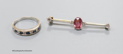 An early 20th century, yellow metal, pink tourmaline and four stone diamond set bar brooch, 47mm,
